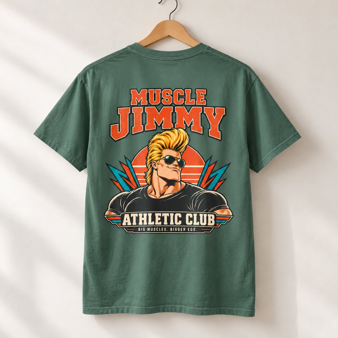 Green Muscle Jimmy tee on a hanger, showing the back print